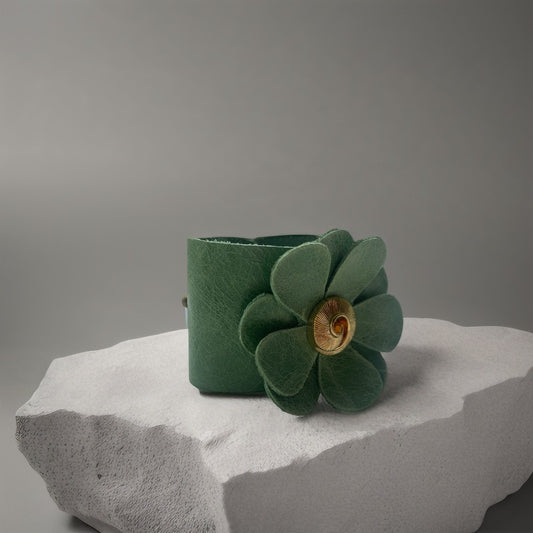 Green Leather Flower Cuff Bracelet with Swirl Button Detail.