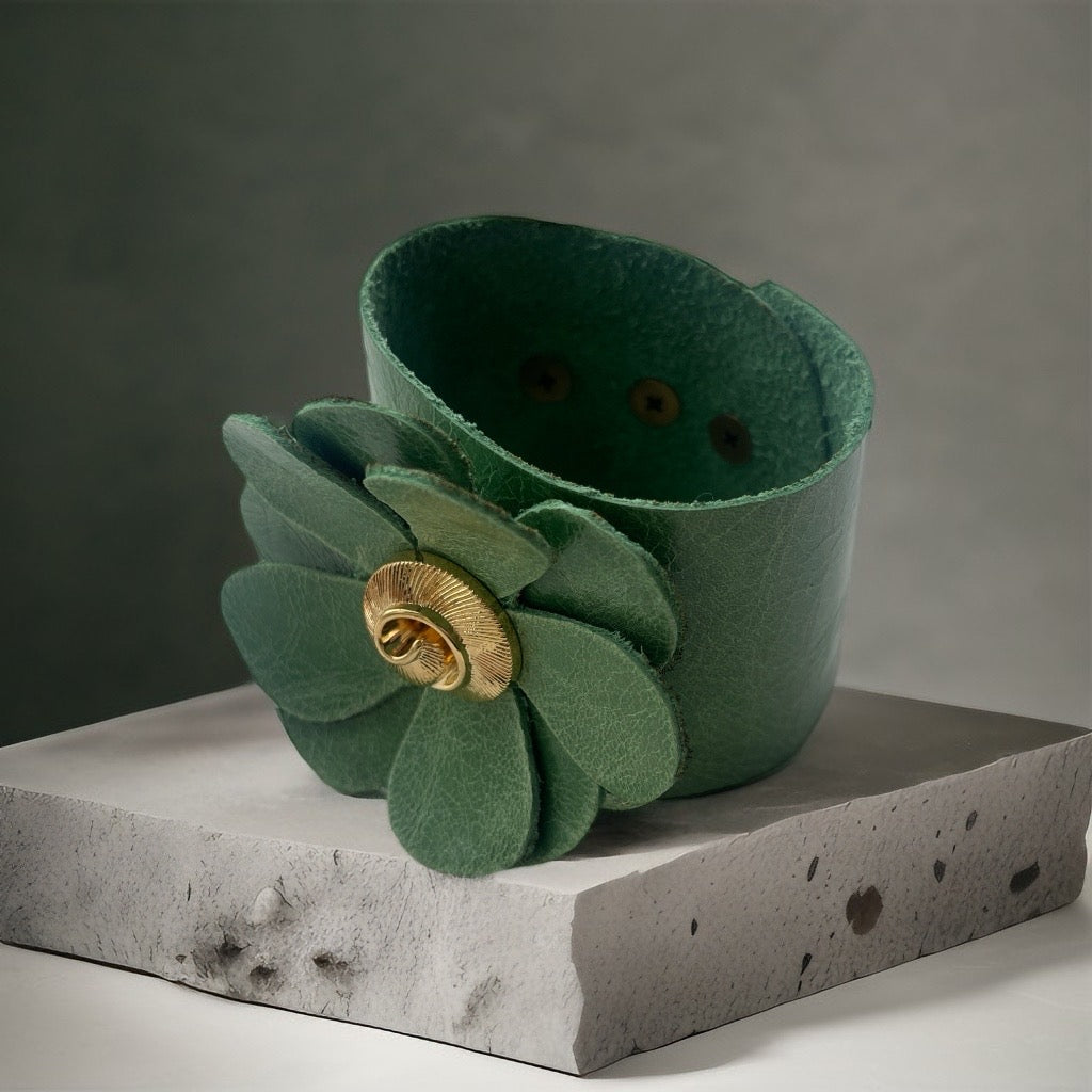 Green Leather Flower Cuff Bracelet with Swirl Button Detail.